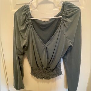 Forest green top. Kinda cropped. Size medium